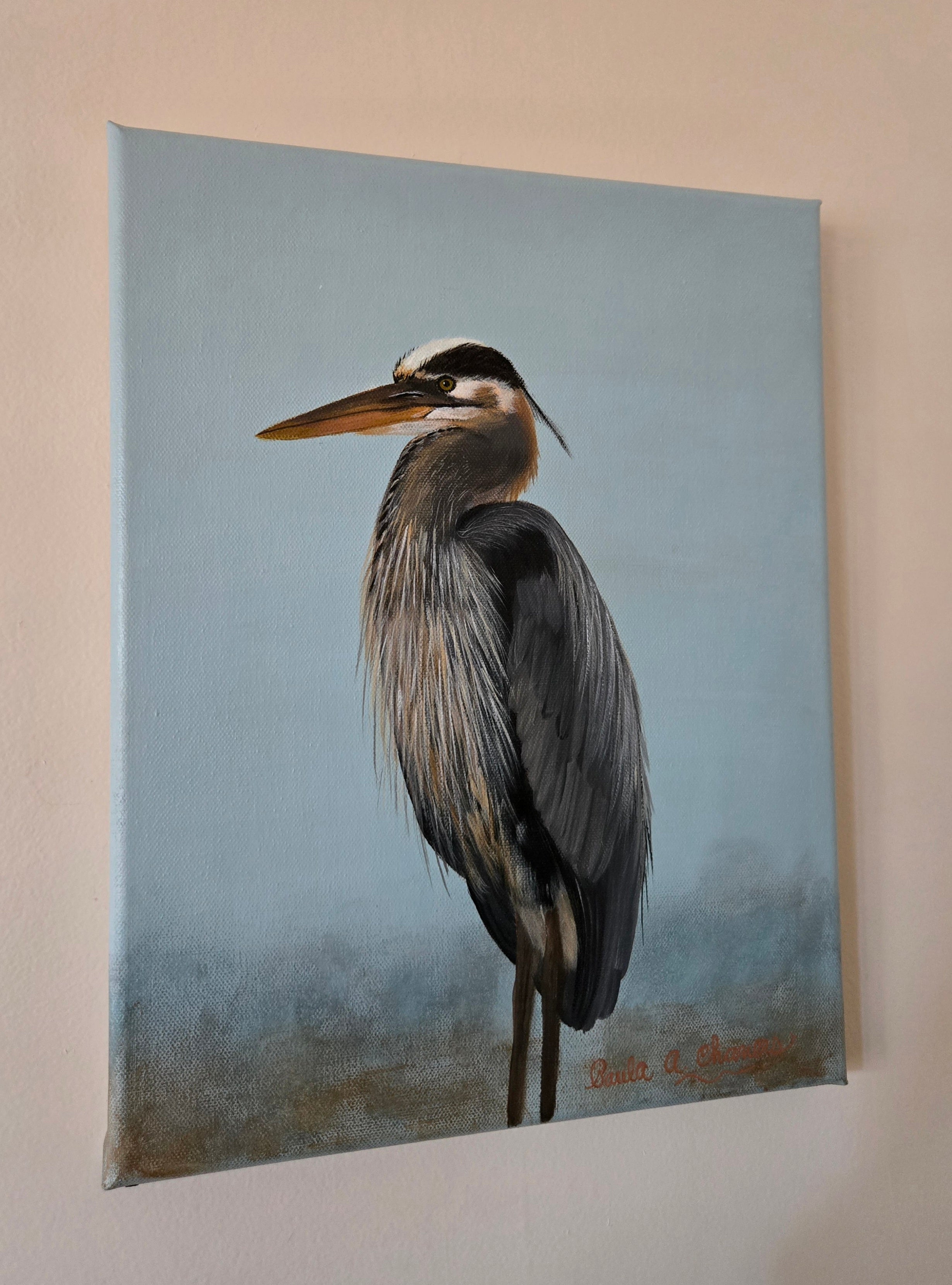 Blue heron standing in water acrylic painting titled 'Still Waters' by Paula A. Chavers, coastal bird wall art 11x14 for beach house decor.